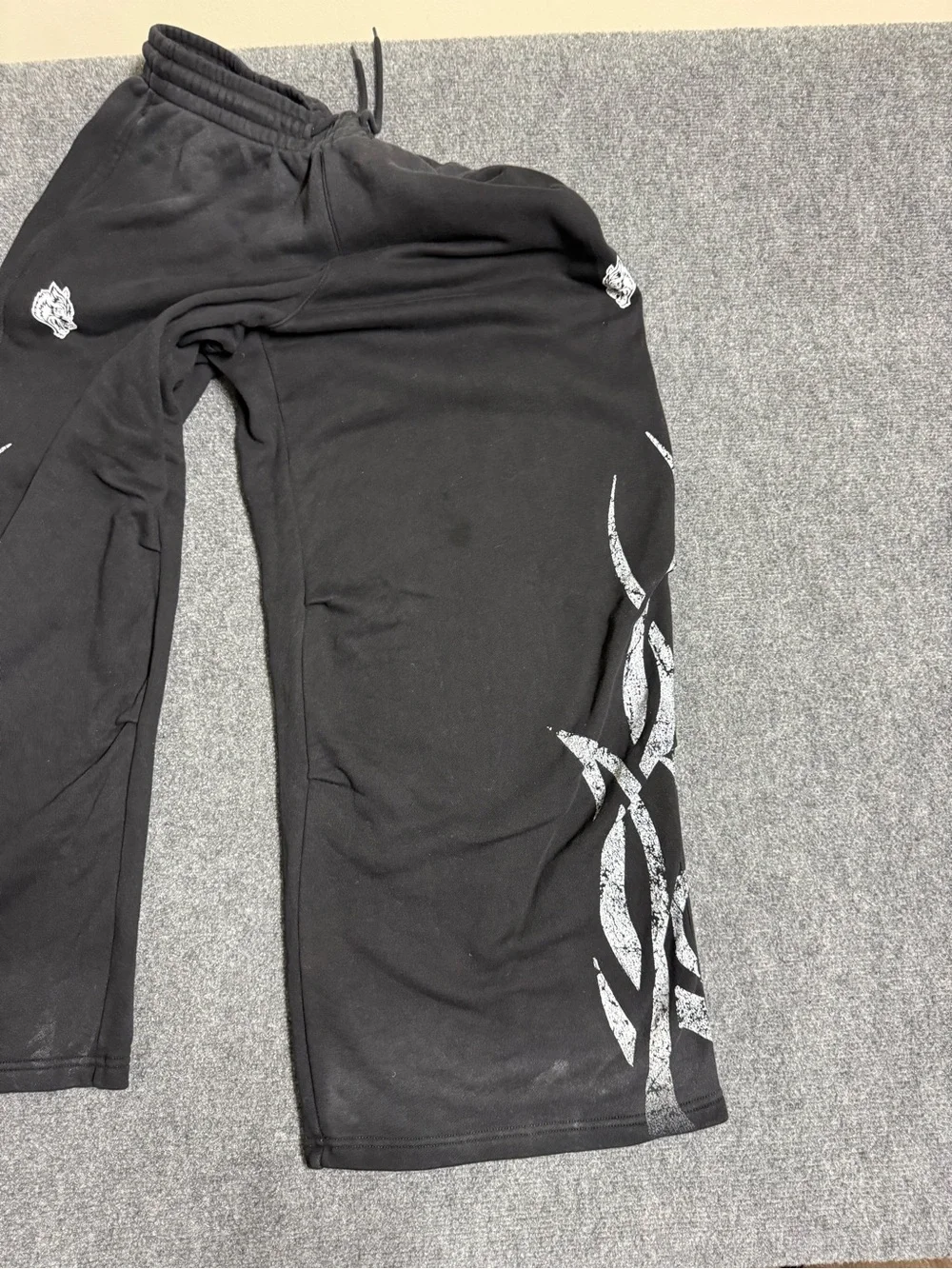 Men's Black Wide-Leg Sweatpants with Silver Tribal Side Graphics